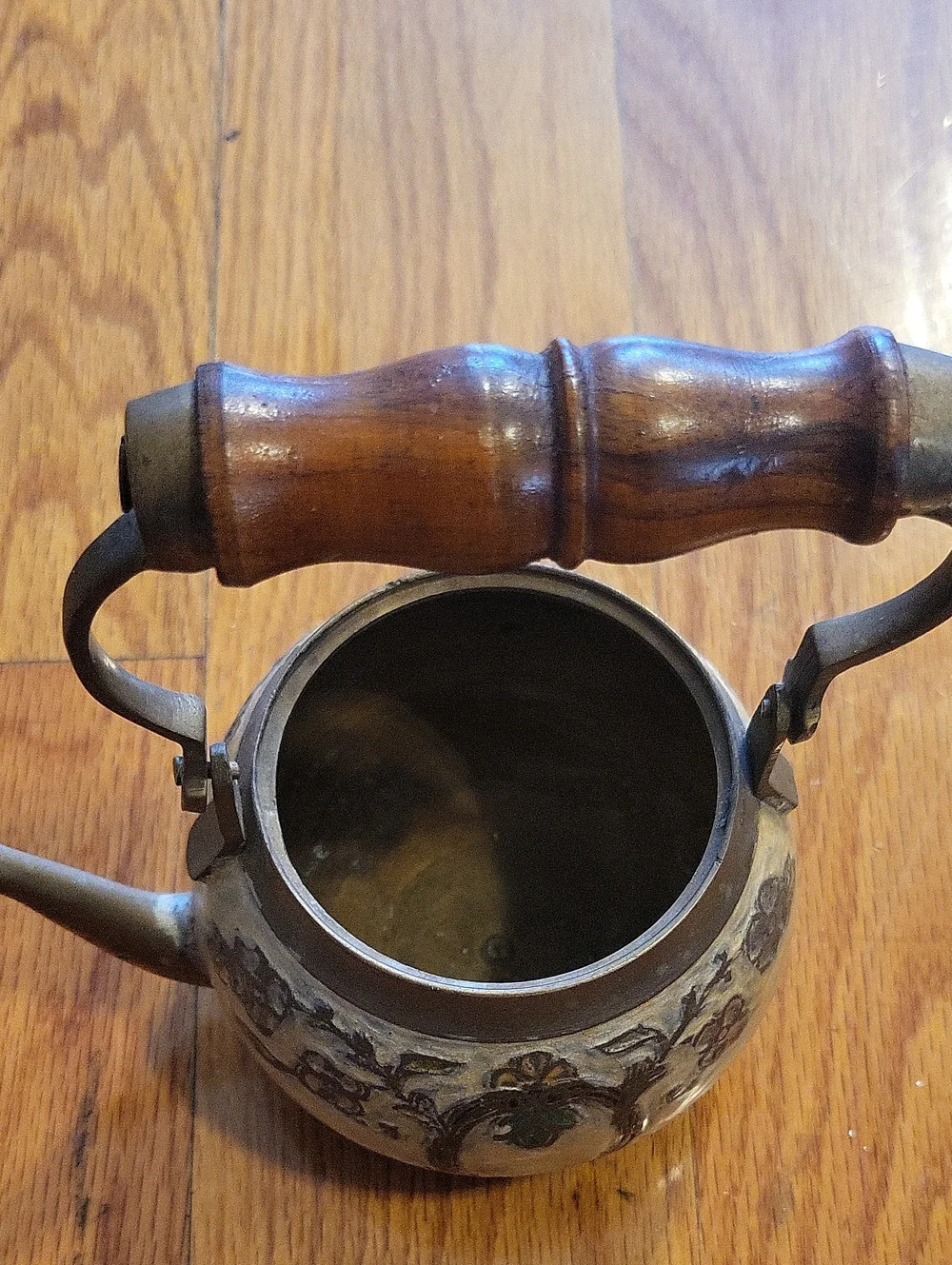 Ornate Brown Metal Teapot with Wooden Handle